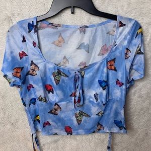 Woman’s butterfly top